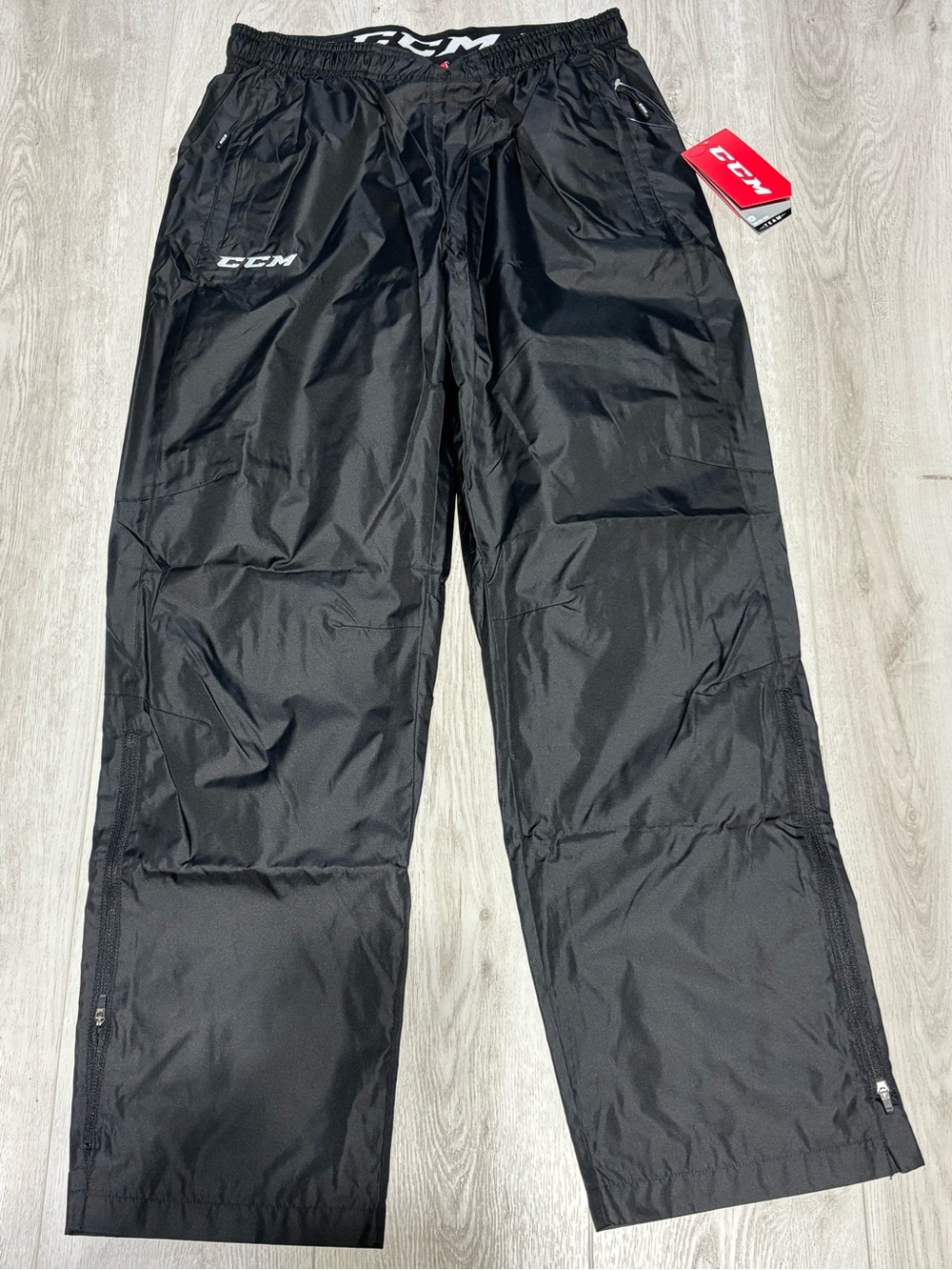 NWT Men's CCM Warmup pants Black lightweight Rink Suit pants – Adult M